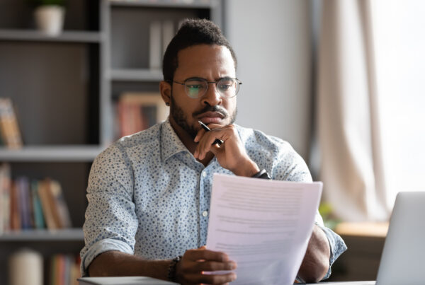 Employee reviewing a WARN Act California layoff notice document