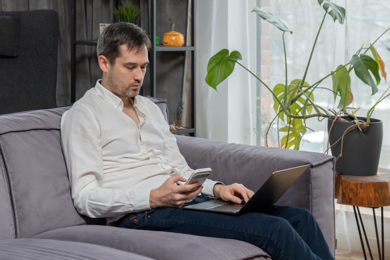 Employee at home researching waiting time penalties California final paycheck