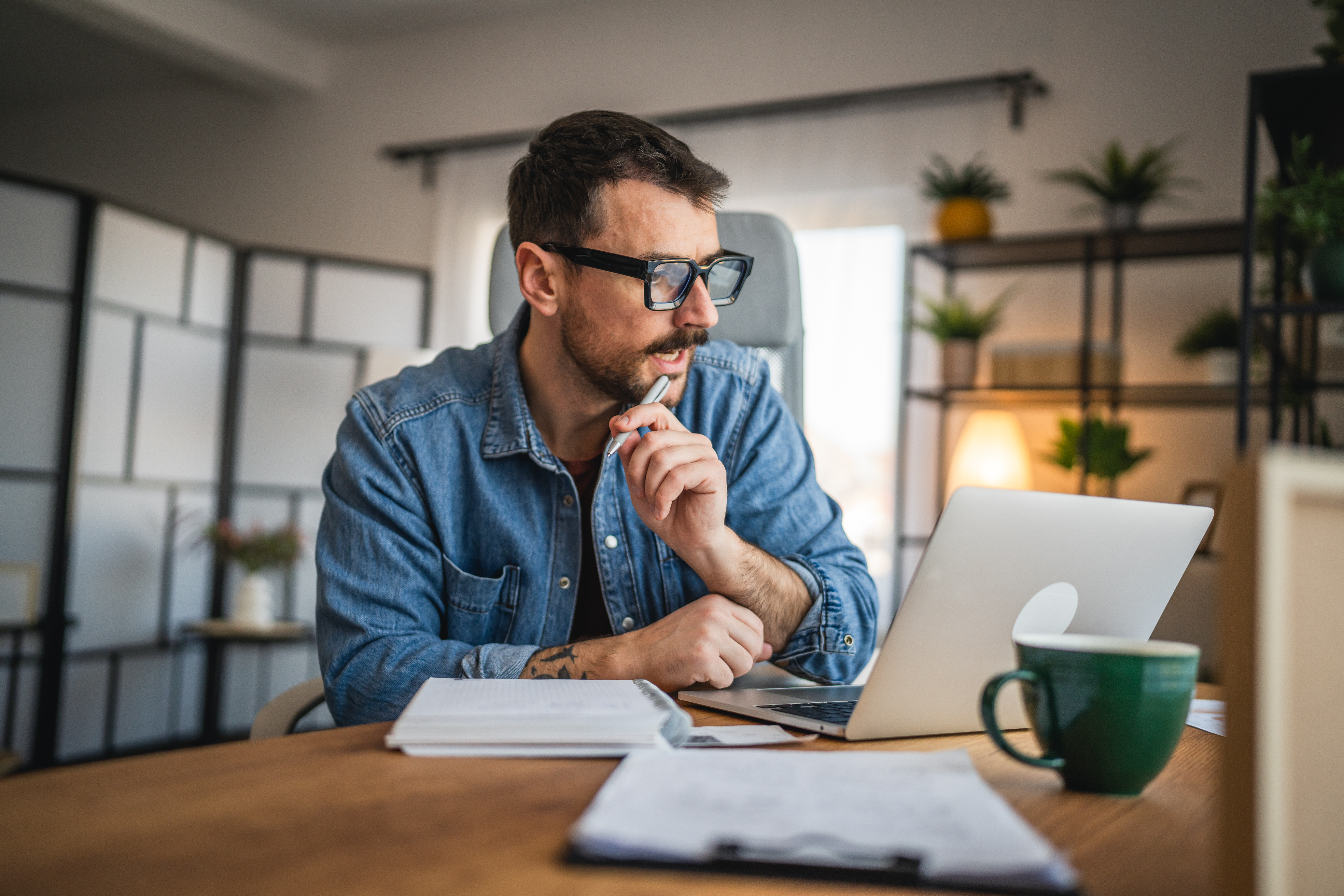 Worker researching wrongful termination settlement options in California