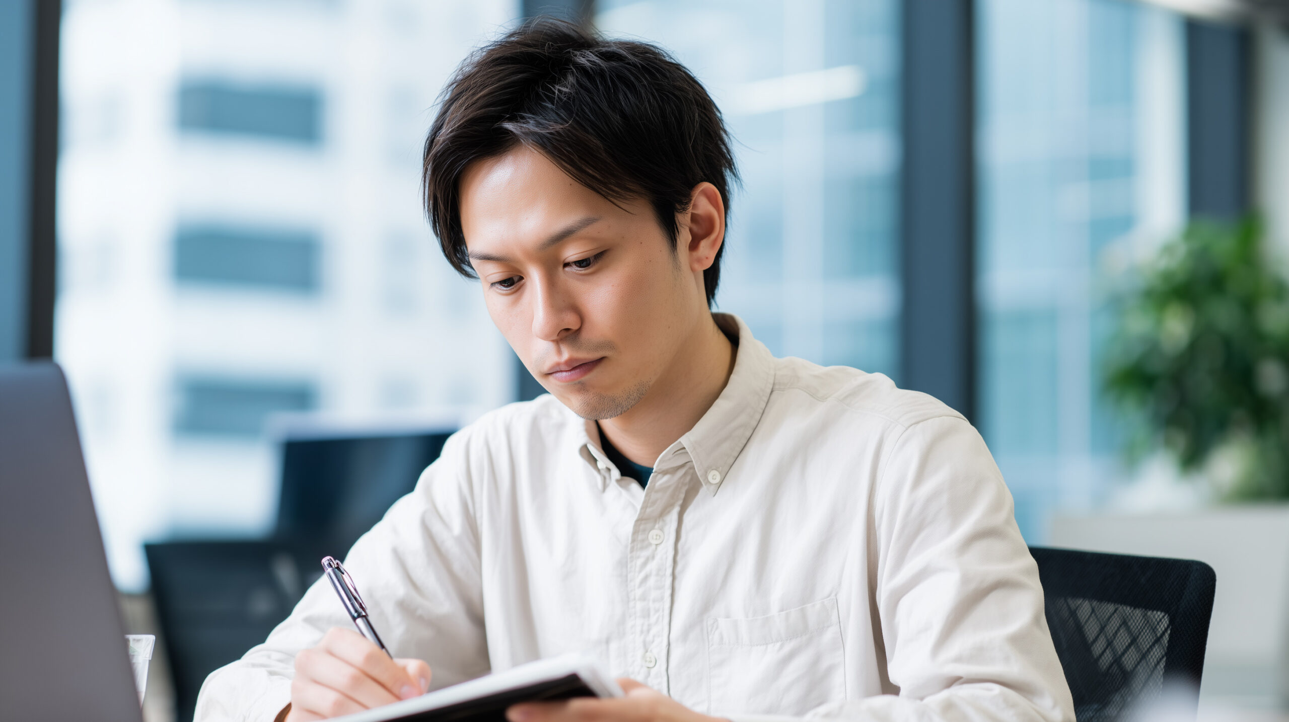 Employee documenting incidents of workplace harassment in a personal log