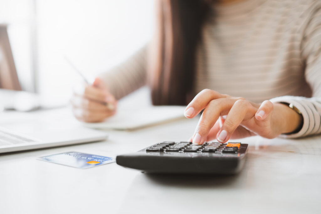 Person calculating financial losses after wrongful termination