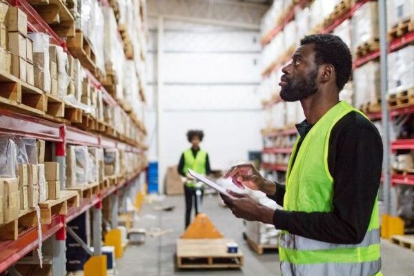 Workers Comp Retaliation California — Warehouse Employee at Work