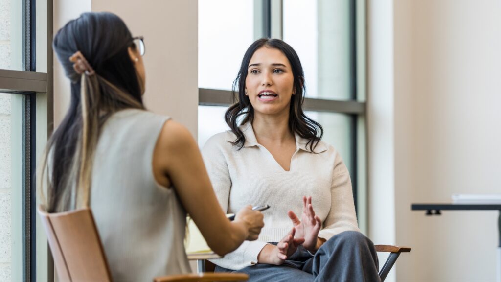 California employee speaking with an employment attorney about signs of sexual harassment at work during a free case evaluation