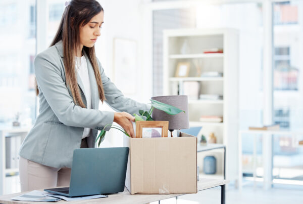 California employee packing up after a wrongful termination that may support a Tameny claim