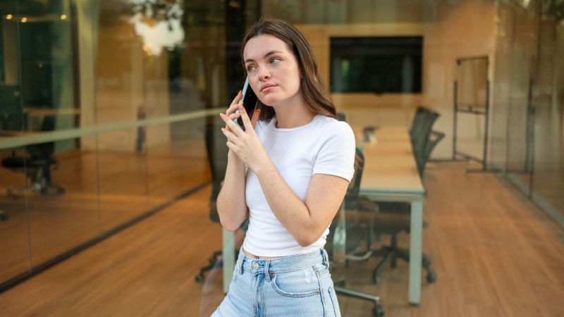 Employee calling her attorney to discuss rights after being demoted for no reason in California