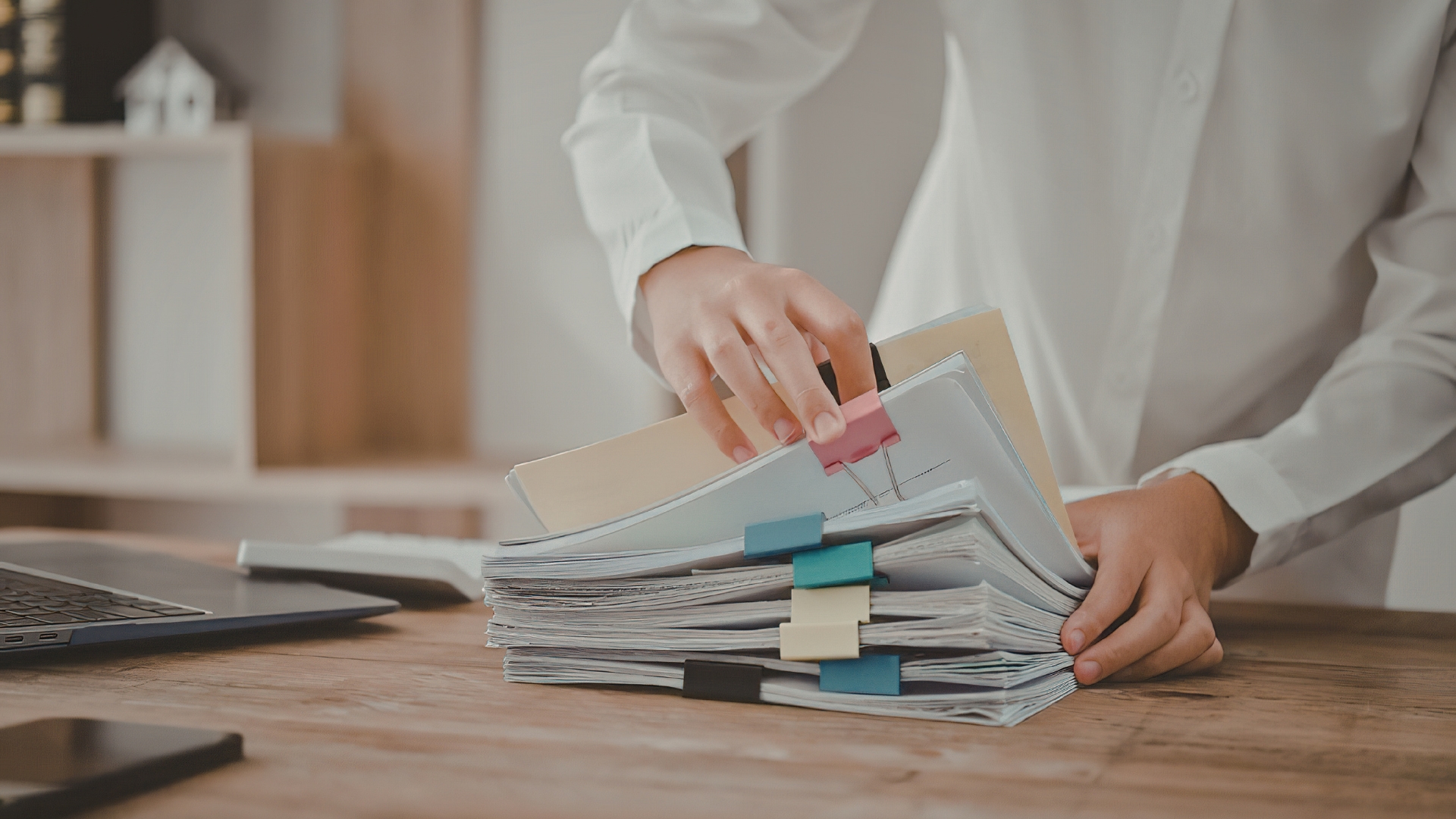Person organizing workplace records to preserve retaliation evidence before access disappears