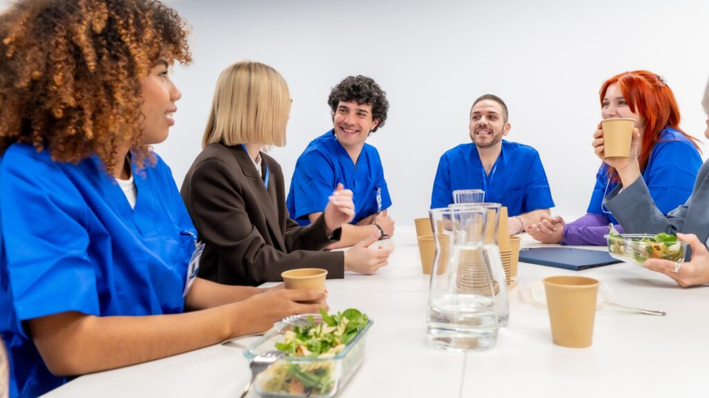 California employees discussing a gender discrimination at work concern during a break