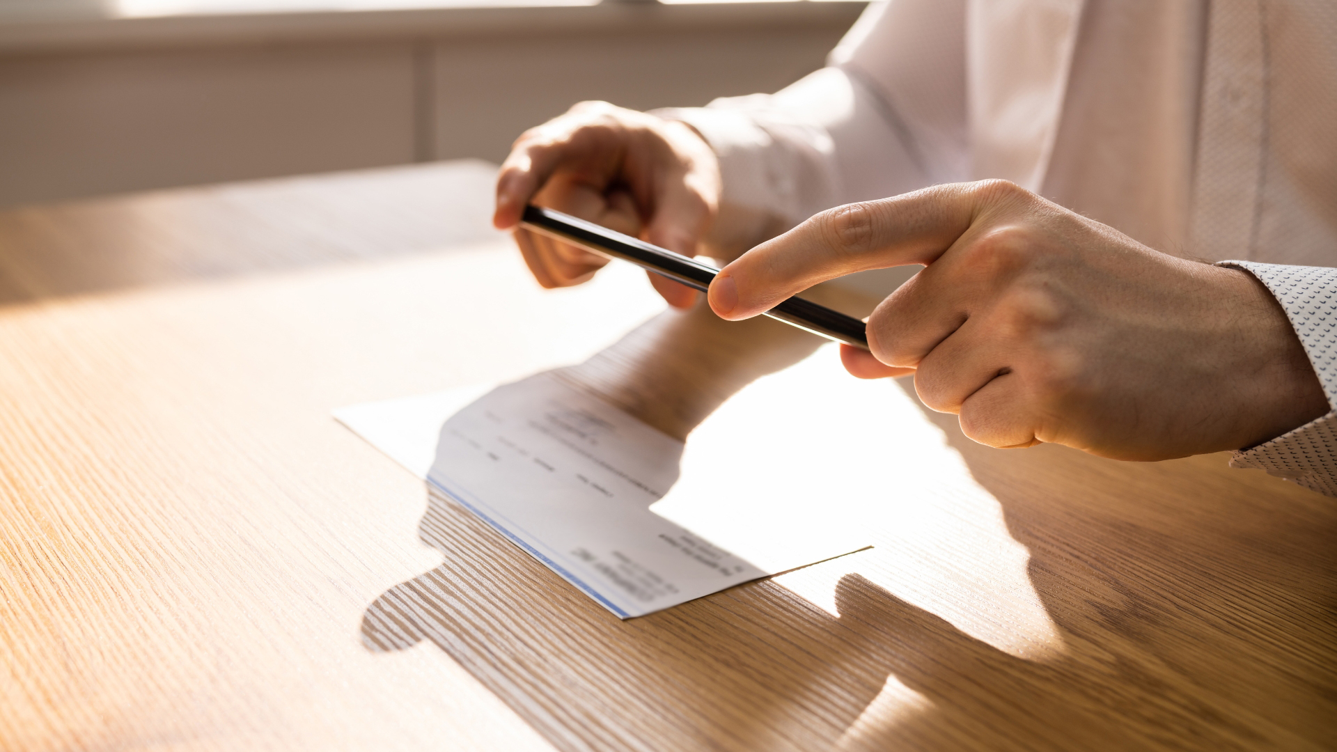 Los Angeles employee photographing a pay stub as evidence for a PAGA claim