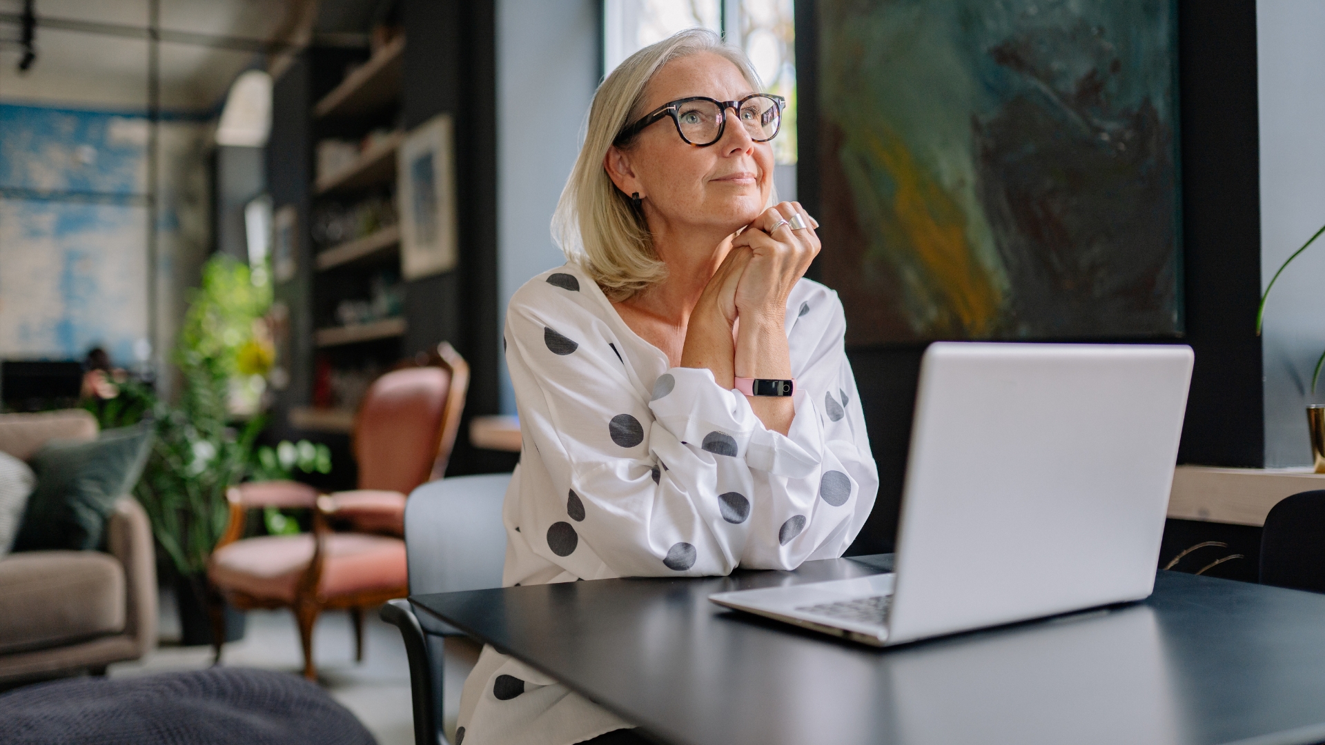 California employee considering her workplace retaliation settlement options at home