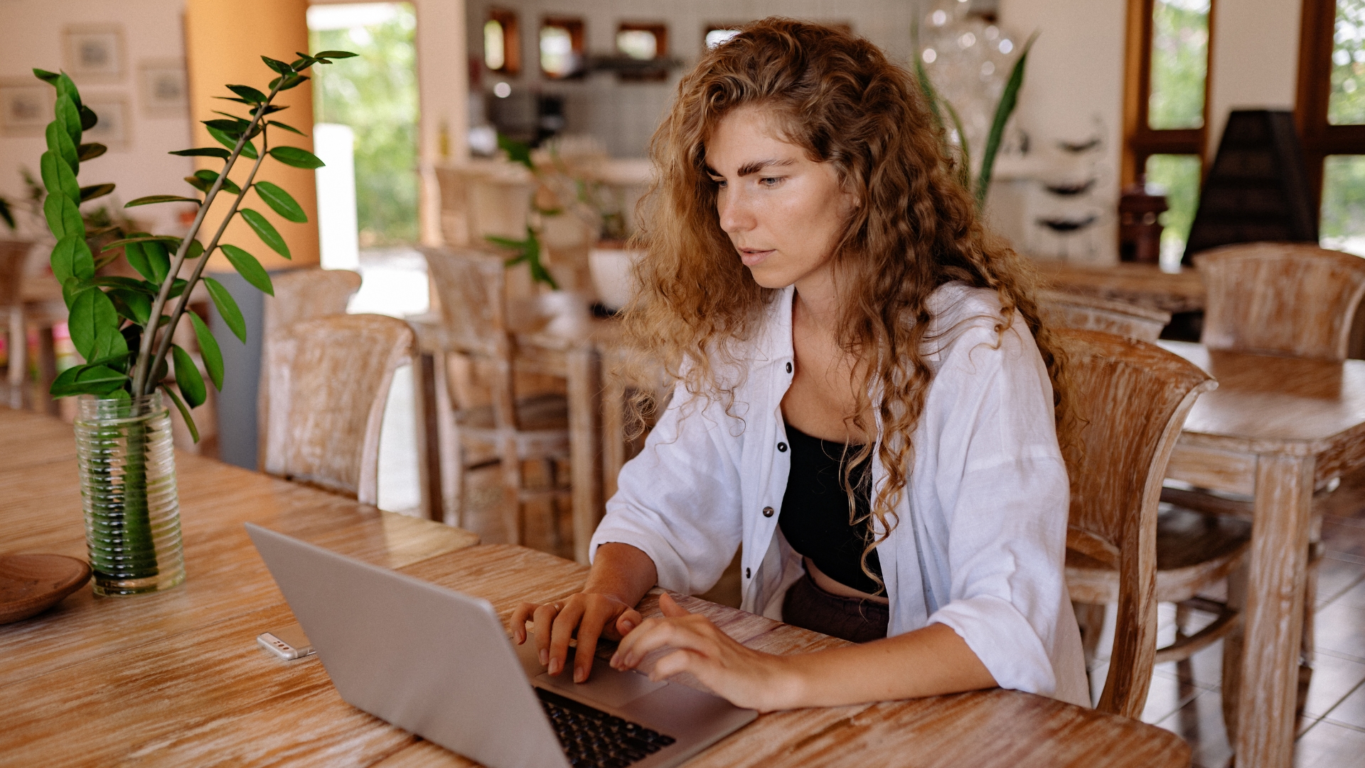California employee researching workplace discrimination protections under FEHA on a laptop