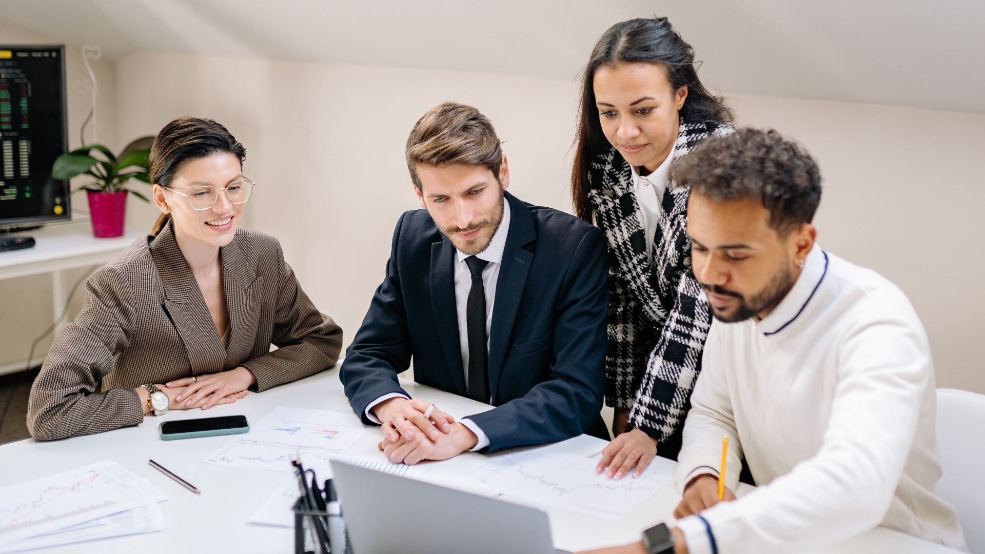 Diverse team of California employees collaborating in an office, the kind of workplace where religious discrimination in the workplace protections apply