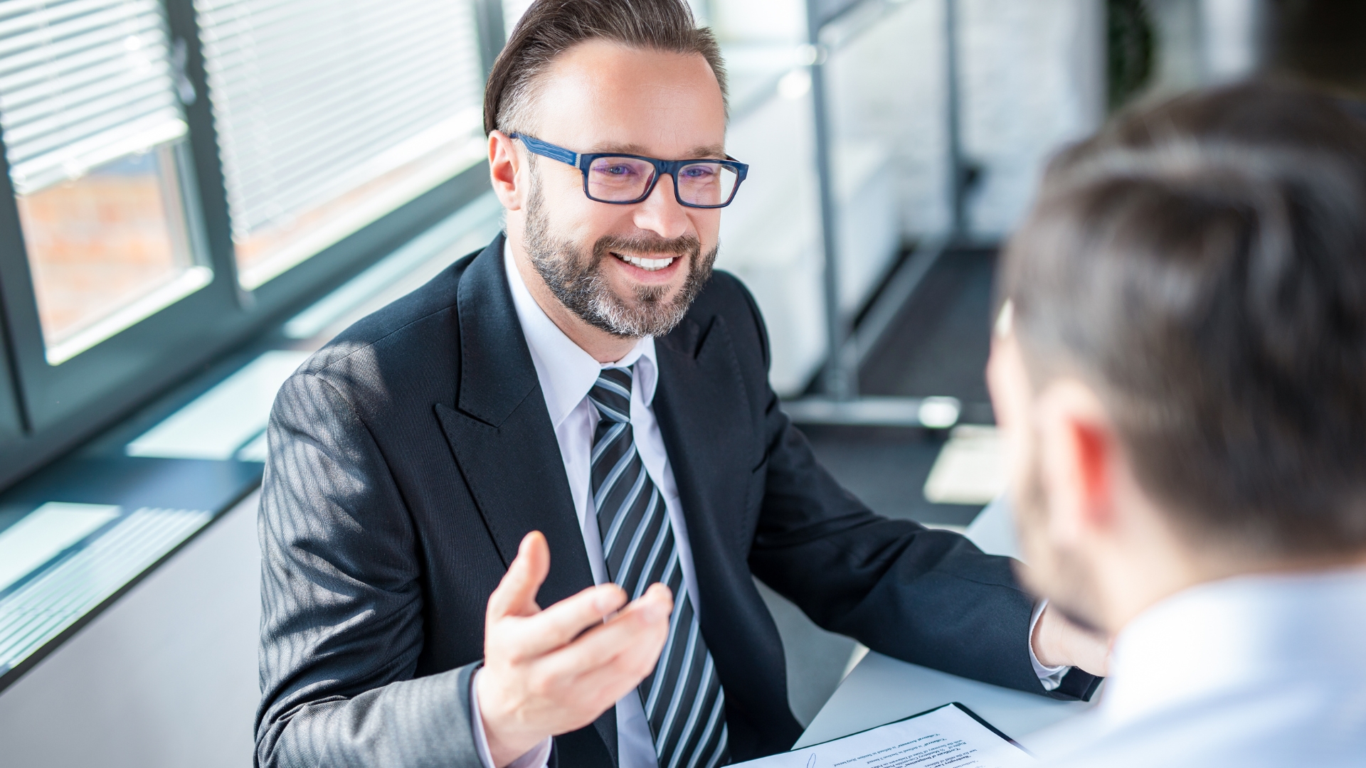 Pasadena employment lawyer meeting with a client to discuss a workplace case