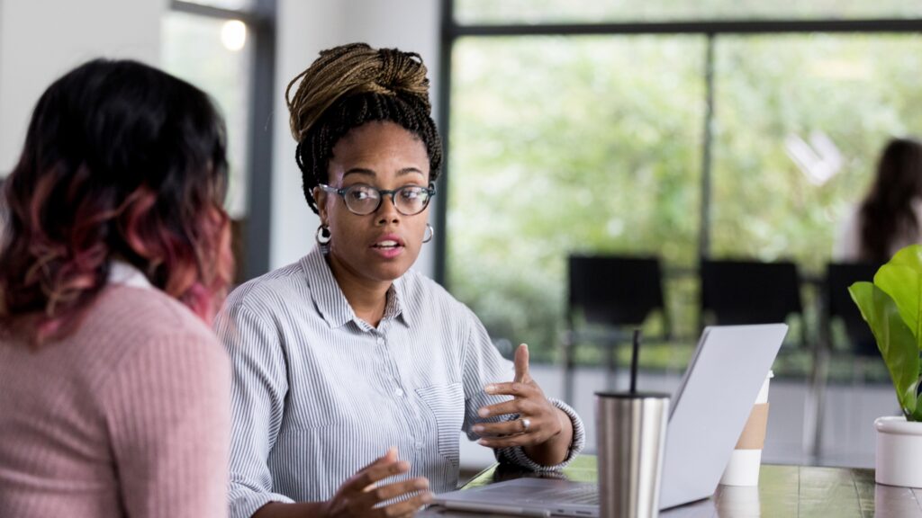 A California employee explains how to prove discrimination at work during a conversation with an advisor