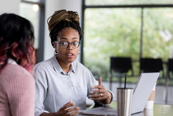 A California employee explains how to prove discrimination at work during a conversation with an advisor