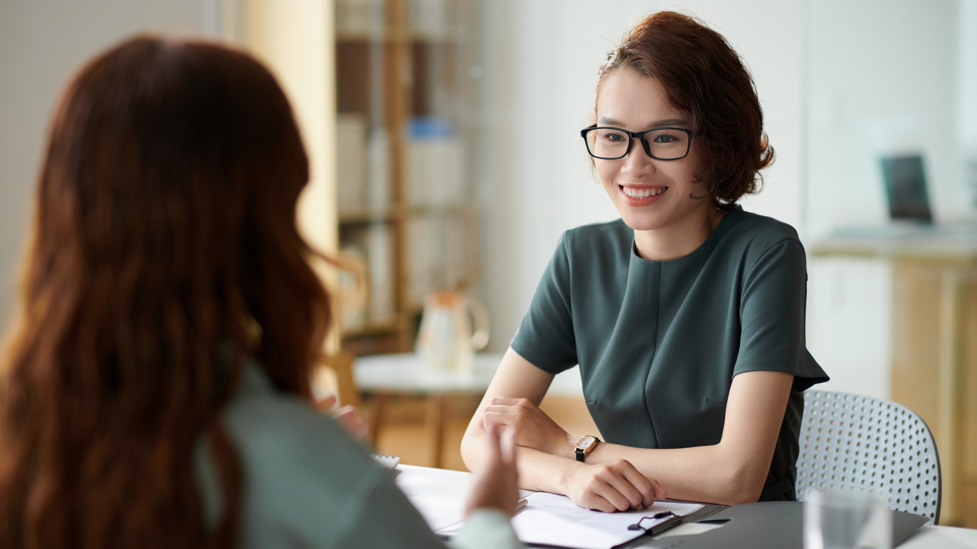 California employee discussing a reasonable accommodation request with her manager