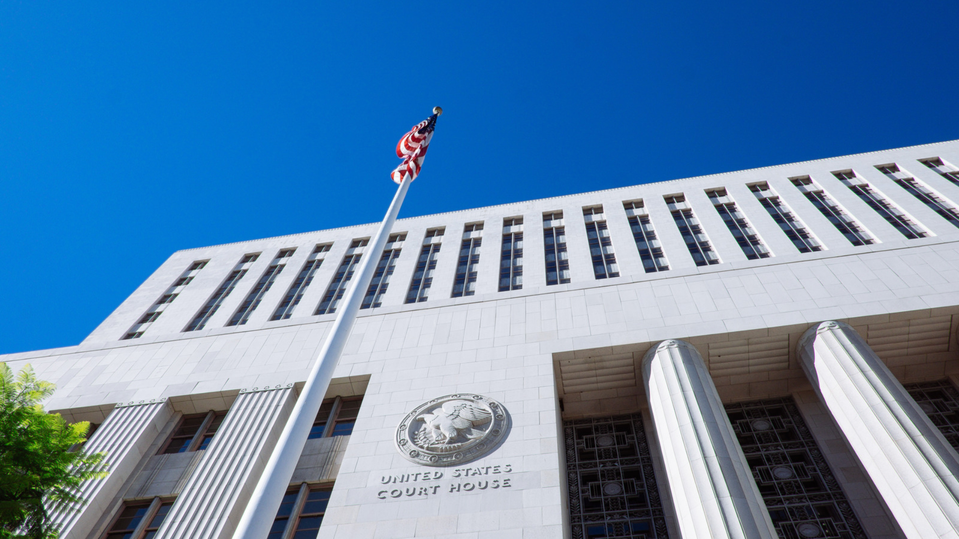 Exterior of a United States courthouse, representing the legal process after filing a harassment claim