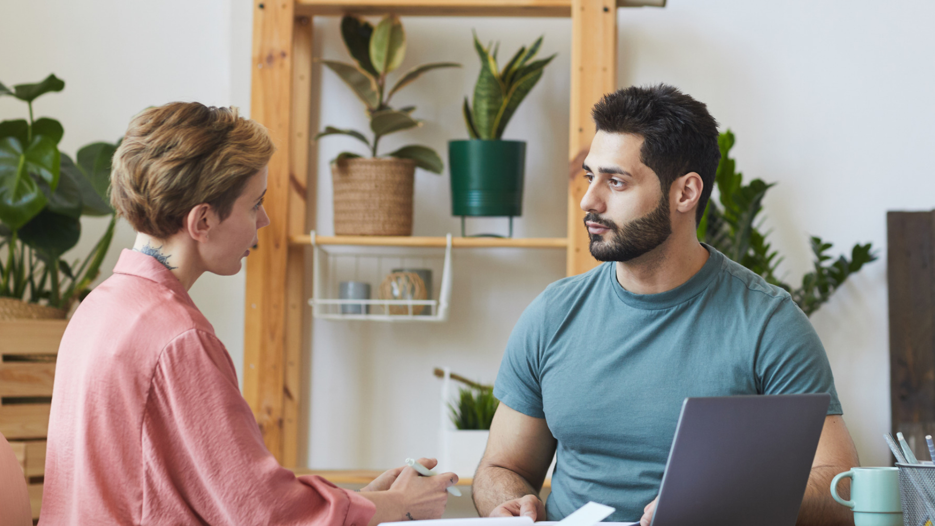 Employee speaking with a manager during a workplace conversation about a formal complaint