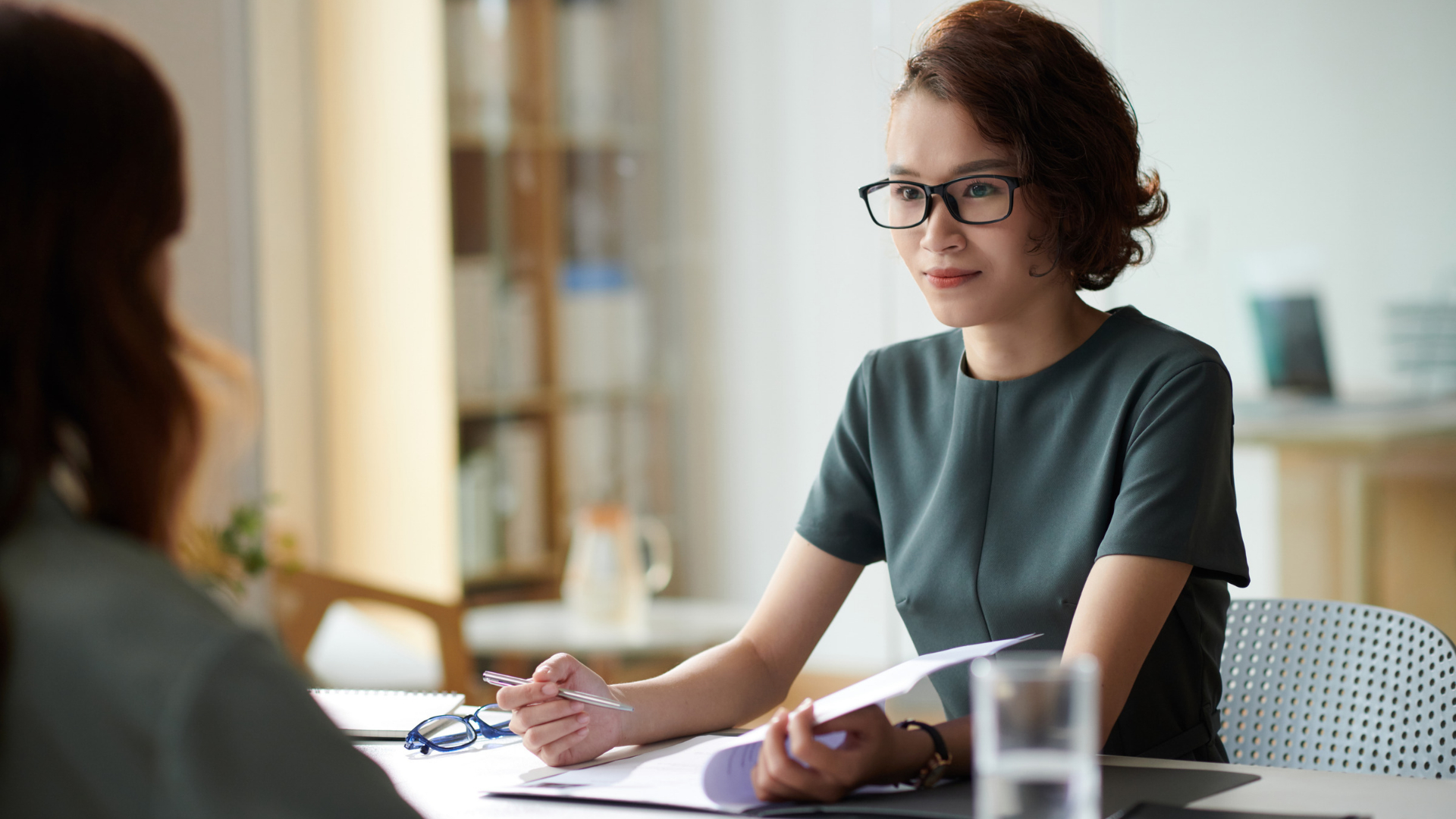 Employee meeting with an Orange County sexual harassment lawyer in a bright office